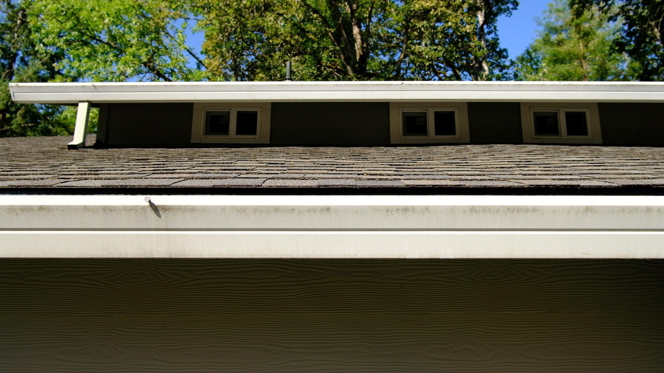 Kirkland Gutter Whitening Service Before and After Photos