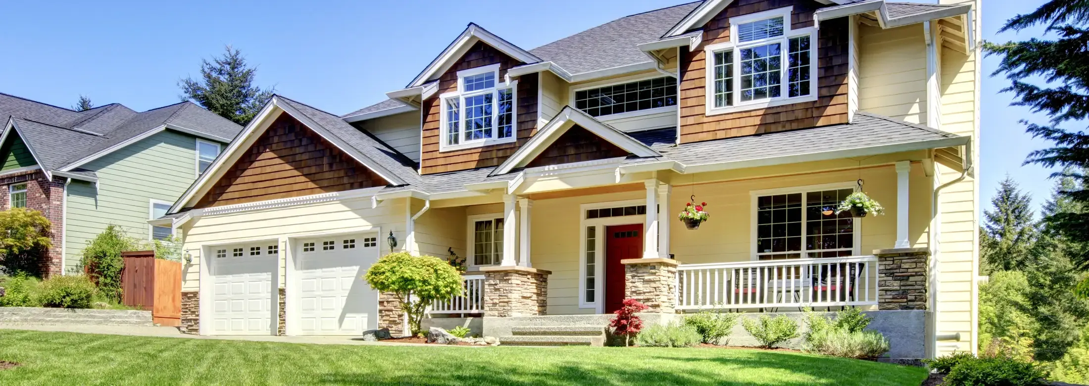 house with nice front yard surrounded by trees